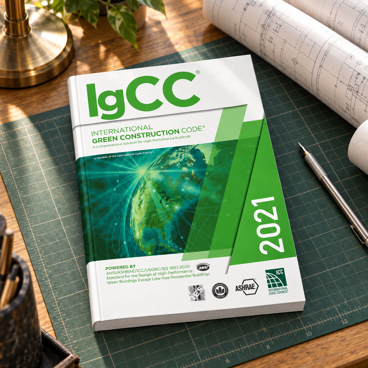2021 International Green Construction Code® (IgCC®) – Softcover on a drafting desk