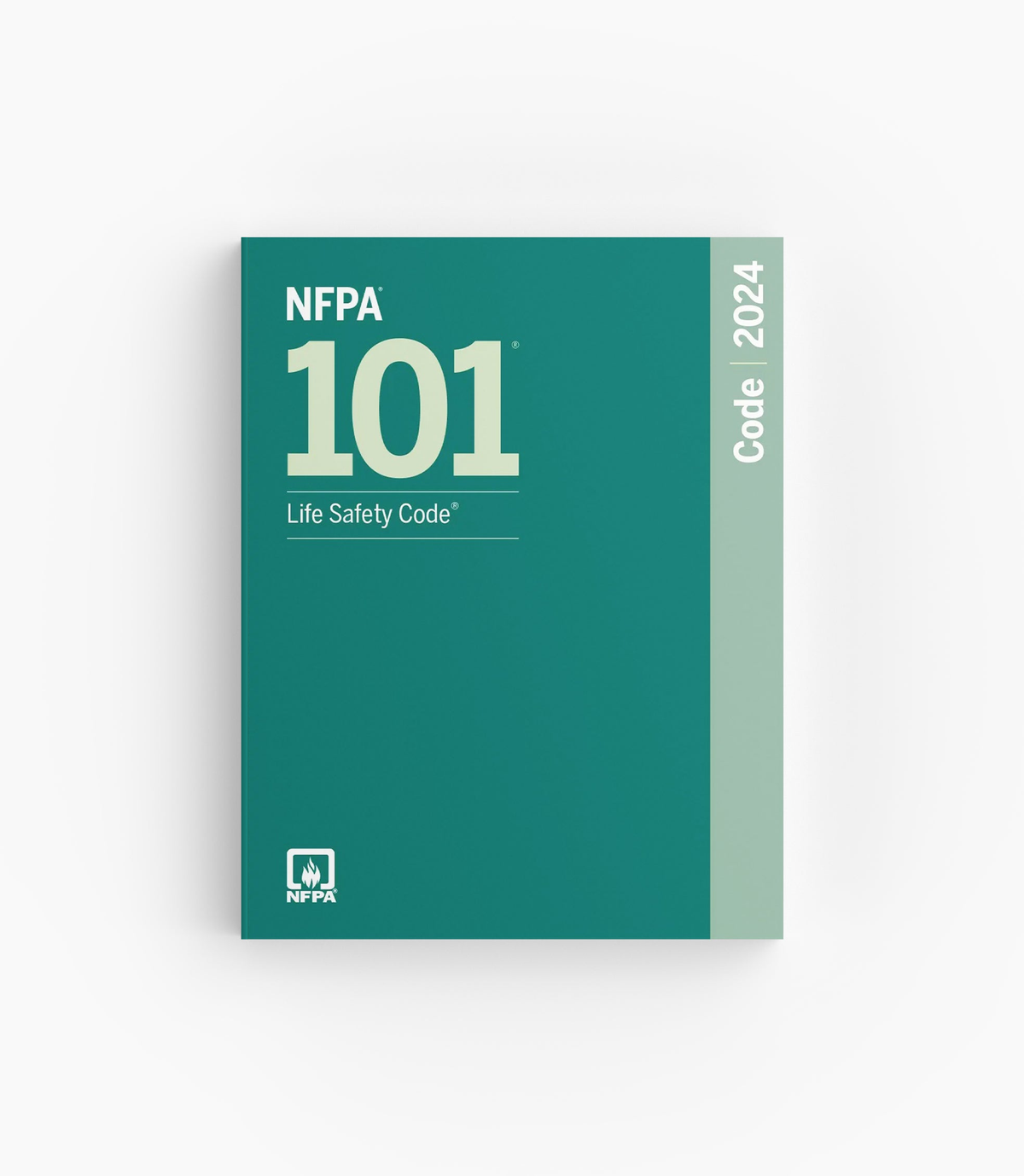 Product photo of 2024 NFPA 101 Life Safety Code, lying flat with the front cover visible.